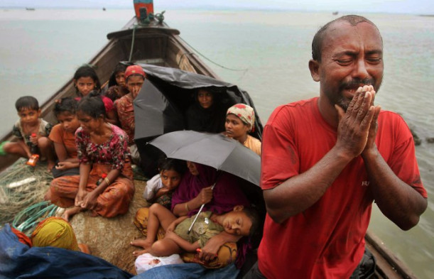 FILE - In this June 13, 2012 file photo, a Rohingya Muslim man who fled Myanmar to Bangladesh to ...