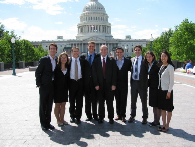 Professor Louis Rulli with students in front of the Capitol.2