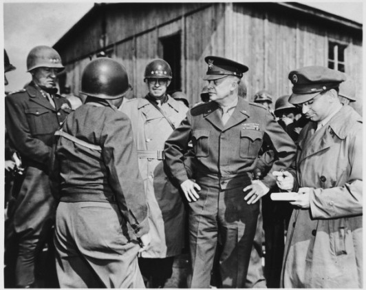 General Eisenhower at Ohrdruf (U.S. Holocaust Museum, courtesy of Felice Grad)